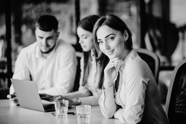 Professionals collaborating in a modern workplace